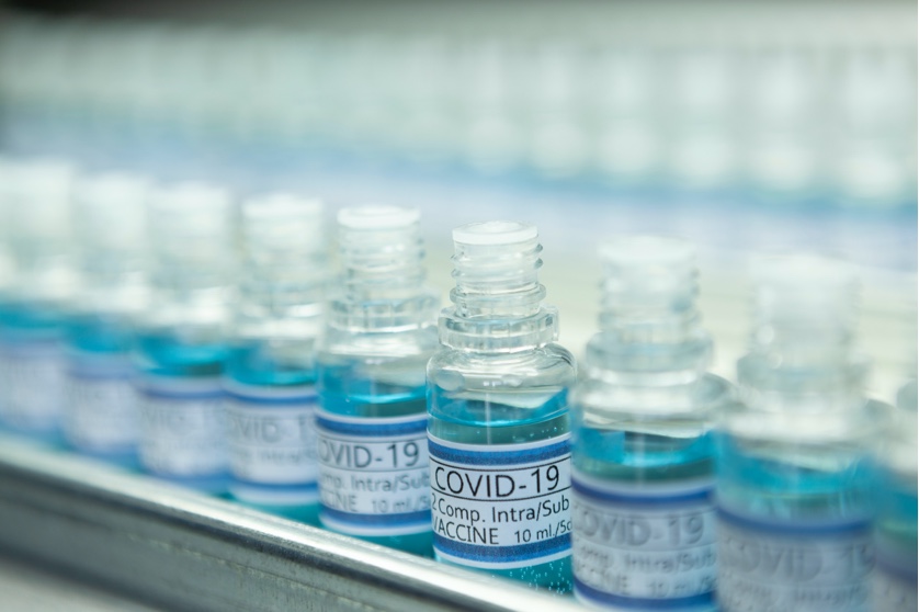 Many Covid-19 vaccine glasses in a row