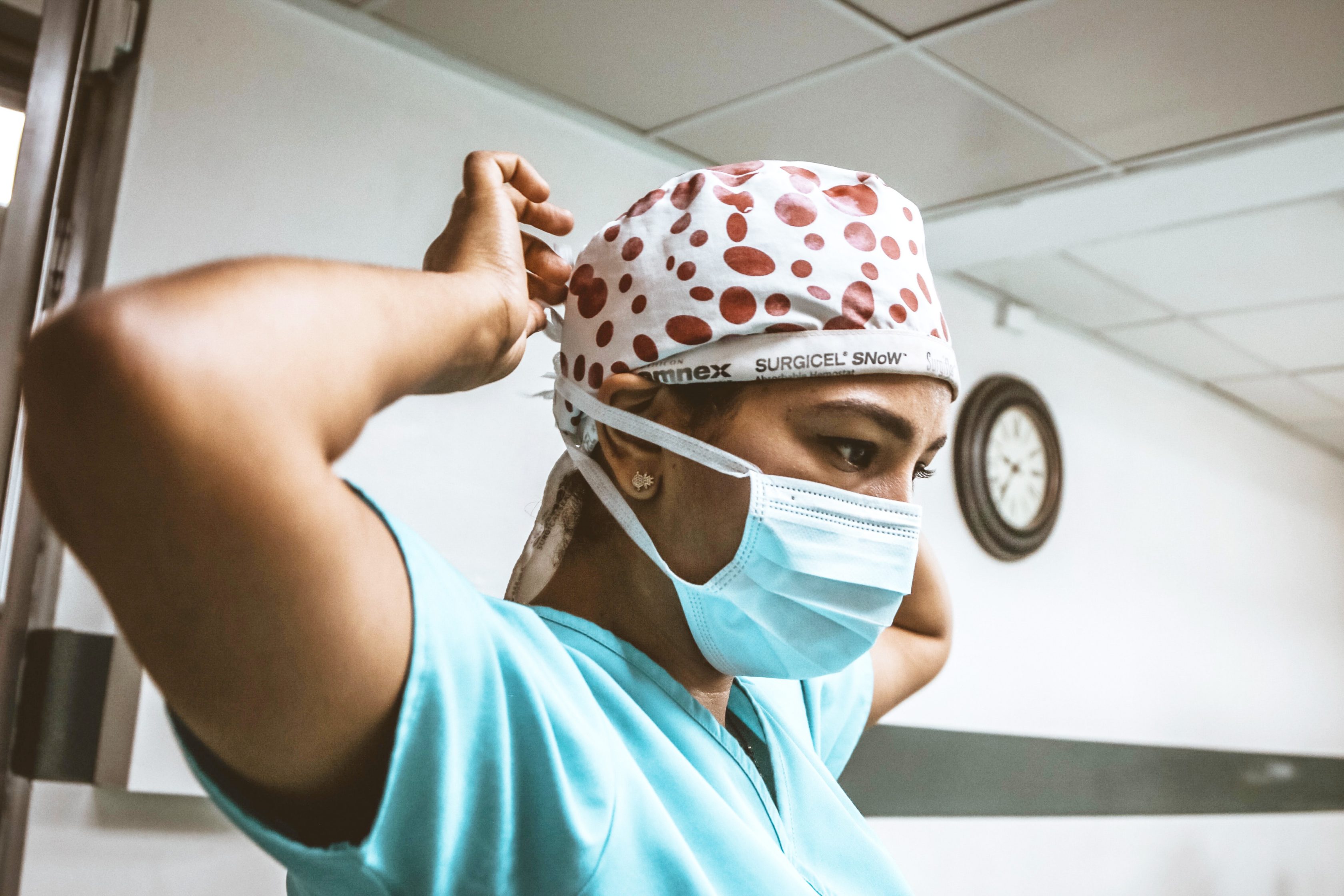 Nurse with mask within hospital environment